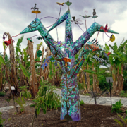 Tree of Life, 2021. Tree: enamel paint on metal and stucco, 96 x 66 x 66 inches; individual sculptures: glazed ceramic, 12 x 12 x 12 inches.